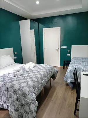 Letto o letti in una camera di Luxury B&B Iolanda