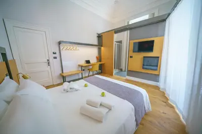 Letto o letti in una camera di Cafuné Rooms