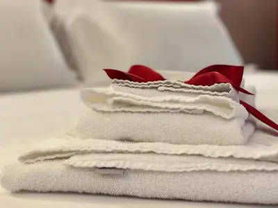 Letto o letti in una camera di B&B Romeo Luxury Rooms
