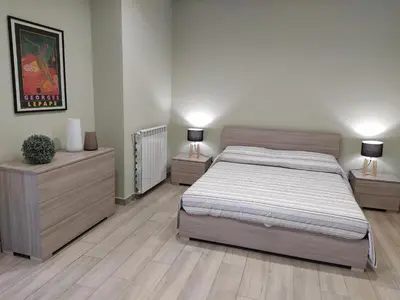 Letto o letti in una camera di Gelsonero Apartments