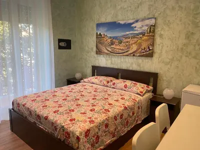 Letto o letti in una camera di B&B CATANIA CENTRO - Charme & More