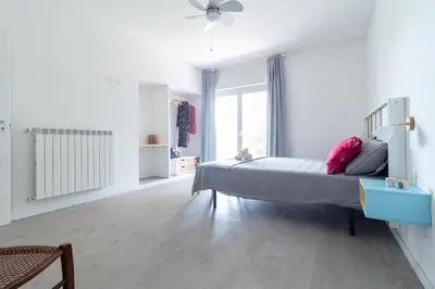 Letto o letti in una camera di NeveNera
