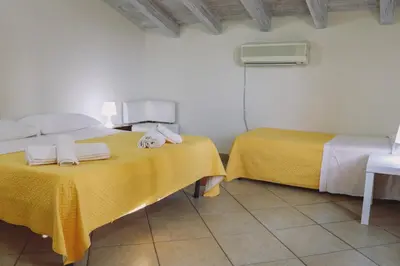 Letto o letti in una camera di Ranch Simeto