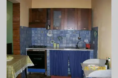 Cucina o angolo cottura di CASA DELLE PALME GIARRE SICILIA A 3 KM DAL MARE