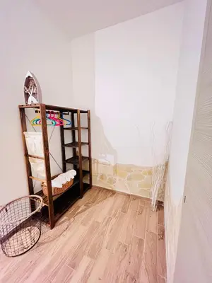 Letto o letti in una camera di Il Mondo