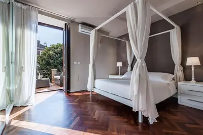 Letto o letti in una camera di Ferrini Home - Via Monte Sant'Agata