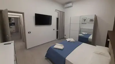 Letto o letti in una camera di Caronda House 2