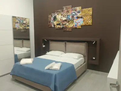 Letto o letti in una camera di Caronda House 2