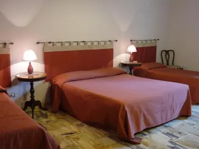 Letto o letti in una camera di La Durlindana B&B