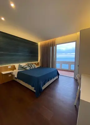 Letto o letti in una camera di Suite Sul Mare