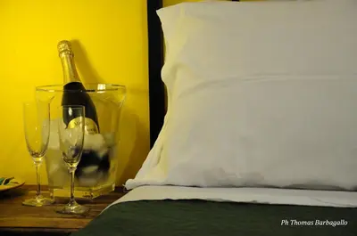 Letto o letti in una camera di B&B Giuseppe Verdi