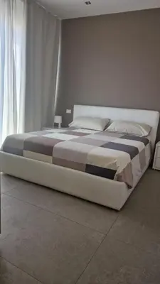Letto o letti in una camera di Giovannino House