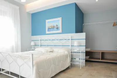 Letto o letti in una camera di La Casa dell'Alloro