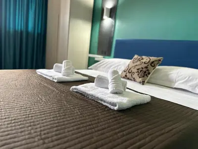 Letto o letti in una camera di Vivendo Rooms