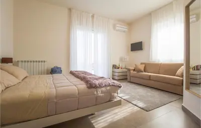 Area soggiorno di Nice Home In Viagrande With Wifi