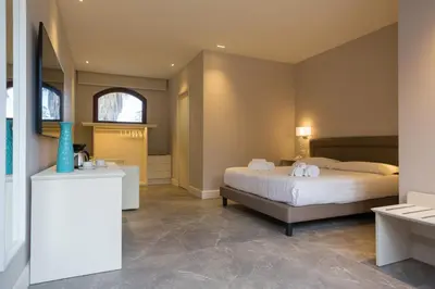 Letto o letti in una camera di Airone Wellness Hotel