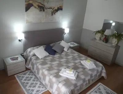 Letto o letti in una camera di Appartampeppe