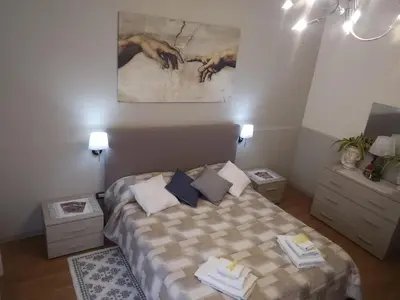 Letto o letti in una camera di Appartampeppe