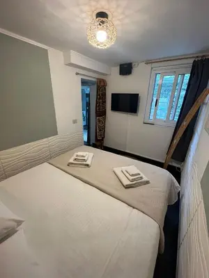 Letto o letti in una camera di Amuri di casa Scogliera