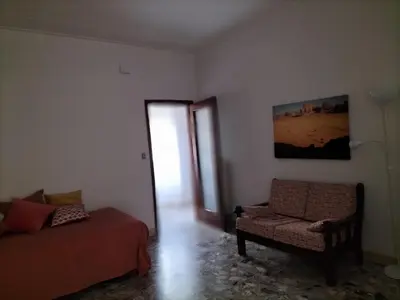 Area soggiorno di Casa del Grillo in centro e nei pressi del mare
