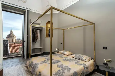 Letto o letti in una camera di 81 Suite and Breakfast