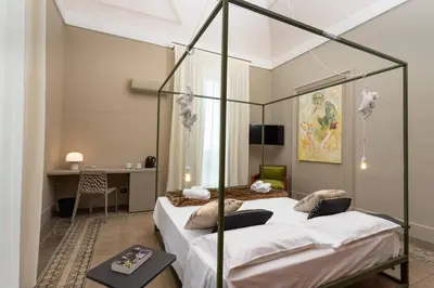 Letto o letti in una camera di 81 Suite and Breakfast