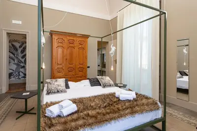 Letto o letti in una camera di 81 Suite and Breakfast