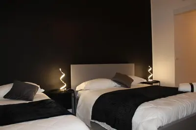 Letto o letti in una camera di Essenza del Tempo Inn