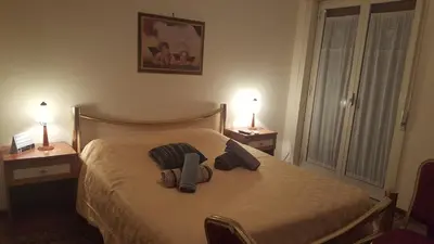 Letto o letti in una camera di B&B United States of Europe