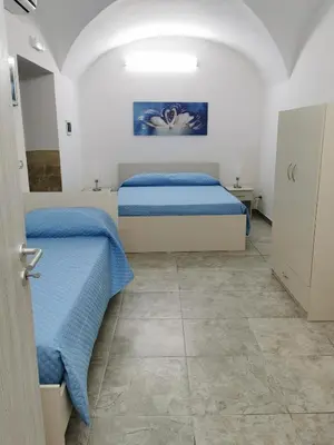 Letto o letti in una camera di House Umberto I