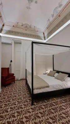 Letto o letti in una camera di La Renaissance