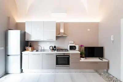 Cucina o angolo cottura di [Catania Center] Modern Apartment