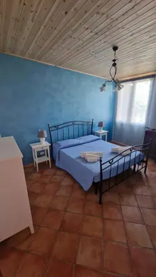 Letto o letti in una camera di Casa della Zagara