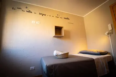 Letto o letti in una camera di L'angoletto del viaggiatore