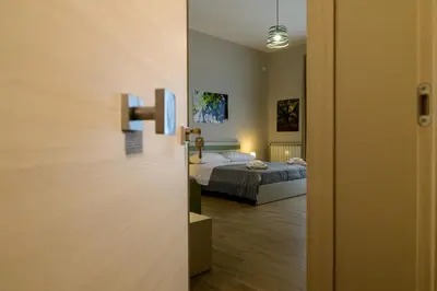 Letto o letti in una camera di Bee Happy - Bed and Breakfast