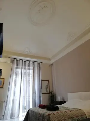 Letto o letti in una camera di Inna's rooms in the History center