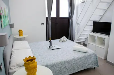 Letto o letti in una camera di Ruggero Settimo - Holiday Houses