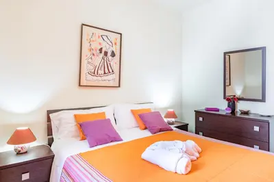 Letto o letti in una camera di GuestHost - Castello Normanno Modern Sea View Apartment