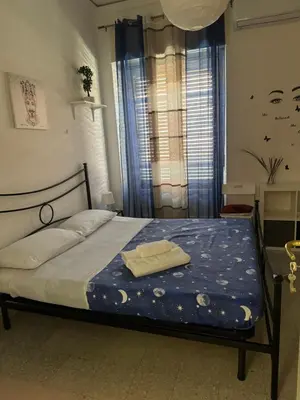 Letto o letti in una camera di ORCHIDEA HOUSE