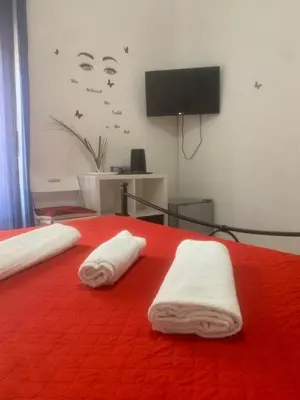 Letto o letti in una camera di ORCHIDEA HOUSE
