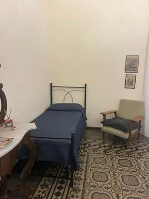 Letto o letti in una camera di Lex Suites