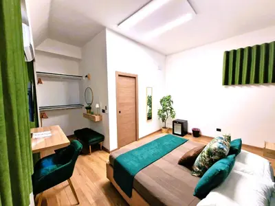 Letto o letti in una camera di B&B ONE