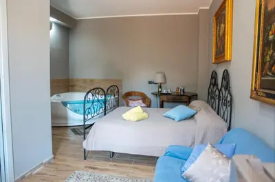 Letto o letti in una camera di Villa Giustega
