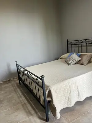 Letto o letti in una camera di Villa Giustega