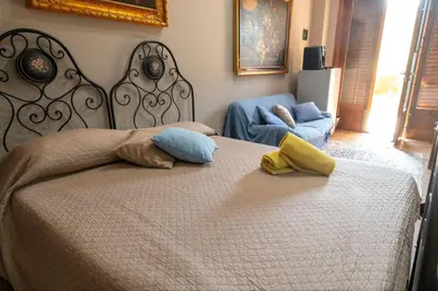 Letto o letti in una camera di Villa Giustega