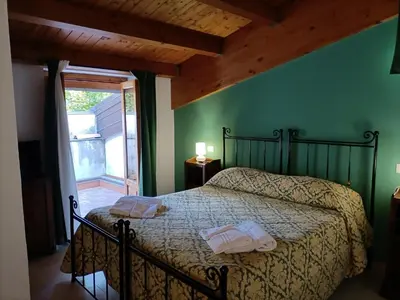 Letto o letti in una camera di Palmento Spuligni