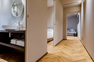 Letto o letti in una camera di Ferrini Home - Etnea Heritage