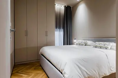 Letto o letti in una camera di Ferrini Home - Etnea Heritage