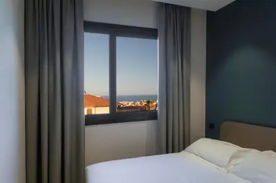 Letto o letti in una camera di Ollen apartments