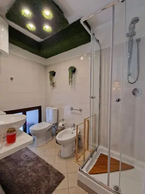 Bagno di ENCANTO APARTMENT